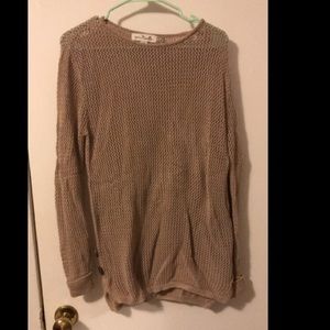 Sweater with buttons on side